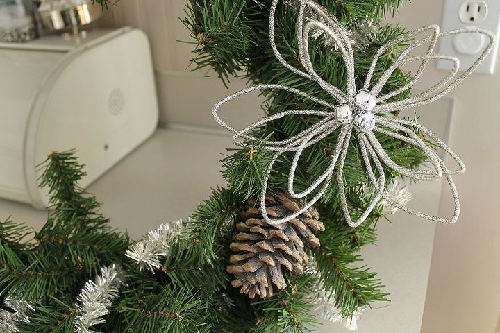 christmas wreath tutorial, christmas decorations, crafts, seasonal holiday decor, wreaths, The pine cones can either be wired on or added with a generous amount of hot glue