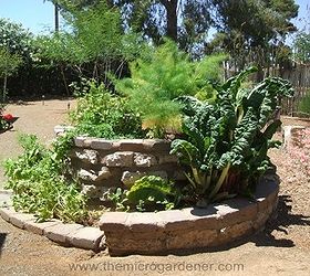 how to build a herb spiral garden, diy, flowers, gardening, homesteading, how to, perennial, Herb spirals can be planted with a variety of edibles flowers perennials as a feature in any compact space