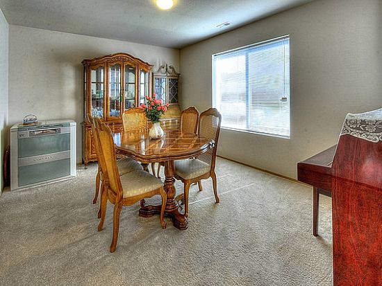 diy baseboard installation, diy, how to, wall decor, woodworking projects, This how the dining room looked when we moved in We ve installed new floors painted and now have crisp white baseboards