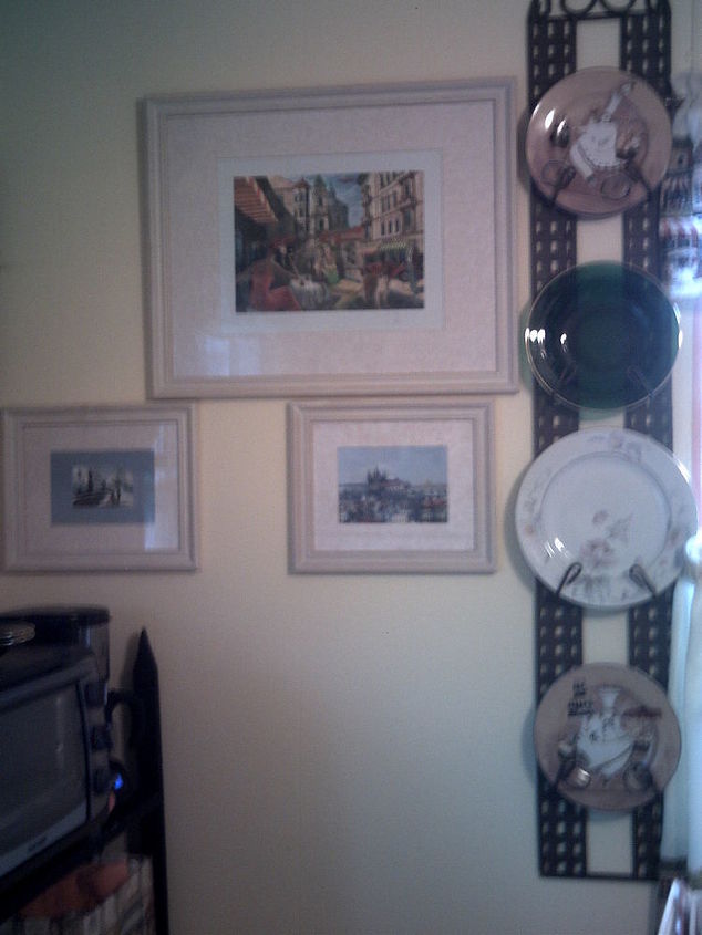what a little paint can do my prague inspired kitchen, home decor, painting, The top is a painting I bought in Prague that was my inspiration and the bottom 2 are photographs I took My great grandmother dishes from Prague hang on the wall