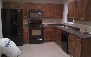 Renovated Kitchen-New Drywall, Paint, Tile, Countertops, Cabinets, Windows, Lighting and Appliances!