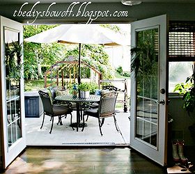 we re in the process of transforming our kitchen on a budget to fit our style we, home improvement, kitchen backsplash, kitchen design, kitchen island, We love that the patio is right off the kitchen with a view of our 50 grape arbor gazebo Cleaning and entertaining are so convenient