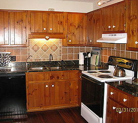 kitchen after remodelling granite countertops and tile backsplash and new lighting, countertops, home improvement, kitchen backsplash, kitchen design, tiling, kitchen after remodelling granite countertops and tile backsplash and new lighting