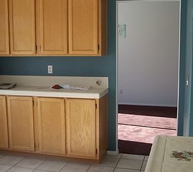 our kitchen remodel step by step, appliances, home improvement, kitchen design, kitchen island, plumbing, tiling, Bank of extra cabinets on other side of doorway