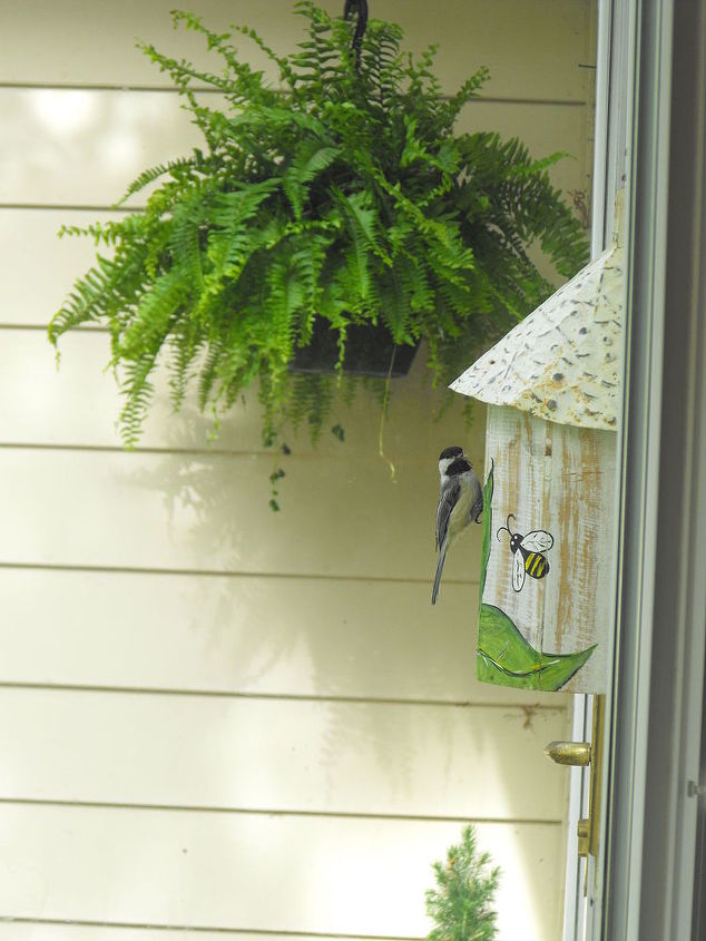 spring, container gardening, easter decorations, flowers, gardening, seasonal holiday d cor, Bird house by front door didn t seem to scare this bird from making a nest