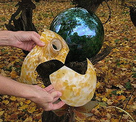 lighted gazing ball mounted in an old log instructions included, gardening, lighting, OH NO A deadly mishap this morning Time for a new colored gazing ball