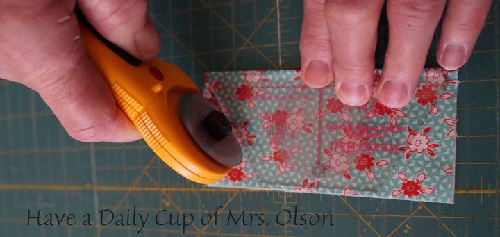 make a quick and fun spring table runner, crafts, Fold in half and cut with the Half Hexie ruler