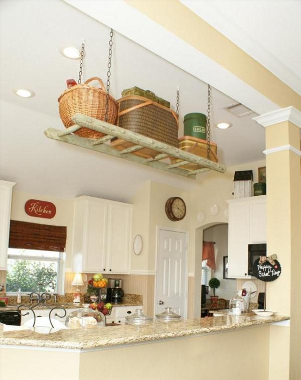 diy ladder project ideas, repurposing upcycling, shelving ideas, storage ideas, Storage space is essential in every kitchen you can significantly increase yours with some wicker baskets Where to put them Arrange them on you old ladder This is a marvellous way to upcycle the unit