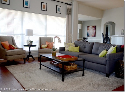living room makeover, home decor, living room ideas, All of the furniture is now cool grays with splashes of orange and lime green
