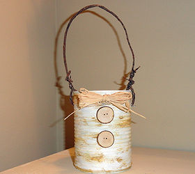 recycled can caddies, crafts, decoupage, repurposing upcycling, I distressed painted this one with white and a rusty paint I glued two of my homemade wood buttons on the front and made a handle with bark covered wire