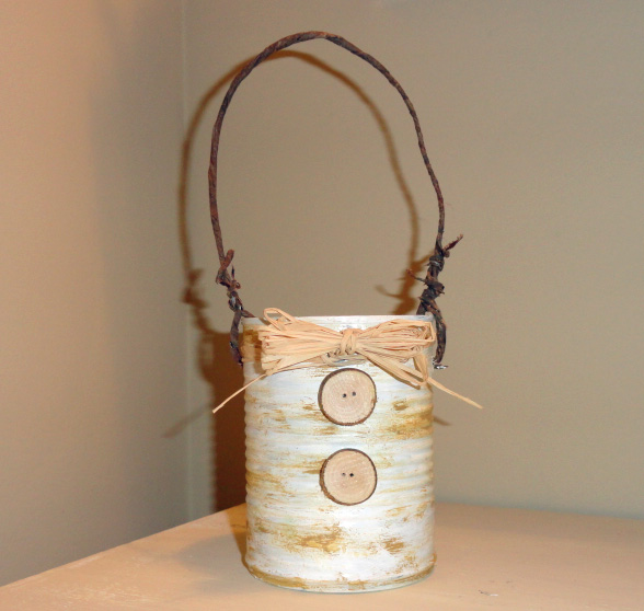 recycled can caddies, crafts, decoupage, repurposing upcycling, I distressed painted this one with white and a rusty paint I glued two of my homemade wood buttons on the front and made a handle with bark covered wire
