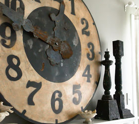 how to decorate your home with just enough by the graphics fairy, home decor, Mix up overscale and small statement pieces like this clock offer an amazing focal point perfect for above a fireplace