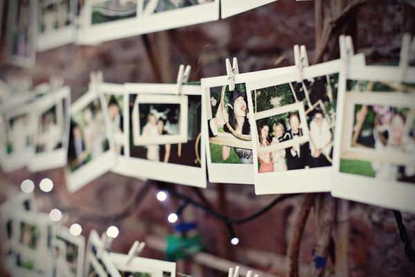 how to create an inexpensive backyard wedding, outdoor living, Cute way for guest to leave their best wishes Polaroids of each guest or couple with their comments underneath These can be used in scrapbooks or permanent decor in your home