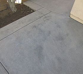 newly poured concrete has dark spots and streaks throughout help