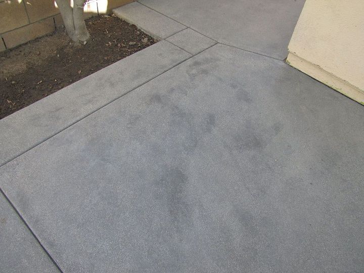 newly poured concrete has dark spots and streaks throughout help