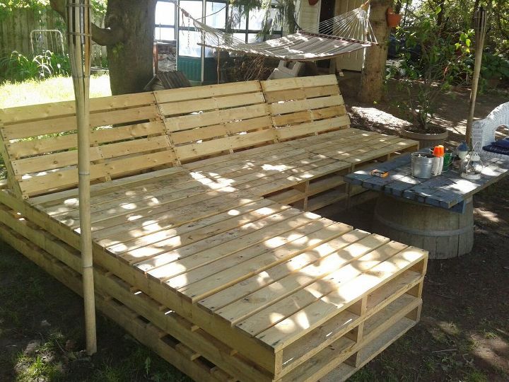 pallet sectional for outside, diy, pallet, repurposing upcycling, Still need to finish around edges and paint then make some cushions But so far its looking great