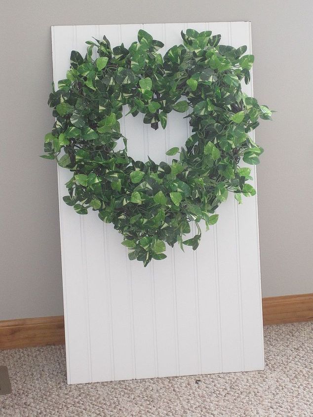 diy boxwood amp bead board wall art, crafts, home decor, wreaths, Then attach your heart wreath to bead board with those peel and stick hooks from the hardware store or WM then finish it off with a stensiled design or words like I did with the word LOVE and a heart see pic above