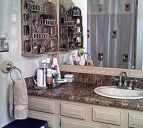 redesigning the main bathroom, bathroom ideas, home decor, home improvement, Mirror framing is complete new countertop with repainted cabinets walls painted shelves from Marshalls