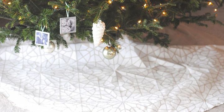 how to make a stenciled tree skirt from a dropcloth, christmas decorations, crafts, painting, seasonal holiday decor, Now our tree has a custom tree skirt that looks like a giant fluffy snowflake The neutral colors allow the tree ornaments and gifts to SING