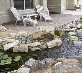 create a backyard oasis with a pond, landscape, outdoor living, ponds water features, When you re not out on the patio enjoying the view open the windows to hear the soothing sound of the waterfall