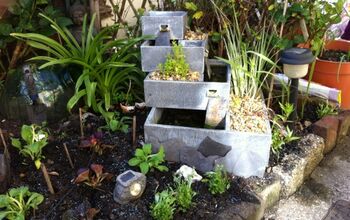 Add Bedding Plants Around a Water Feature to Settle It Into Its Space