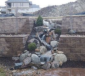 water features through walls, gardening, landscape, outdoor living, ponds water features, wall decor, An ugly retaining wall now becomes the highlight of this Castle Pines Colorado back yard