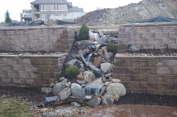 water features through walls, gardening, landscape, outdoor living, ponds water features, wall decor, An ugly retaining wall now becomes the highlight of this Castle Pines Colorado back yard