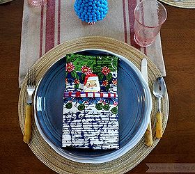 candy land christmas tablescape, christmas decorations, crafts, seasonal holiday decor, Napkins are folded using simple pocket fold A chocolate Santa peeks out from the pocket