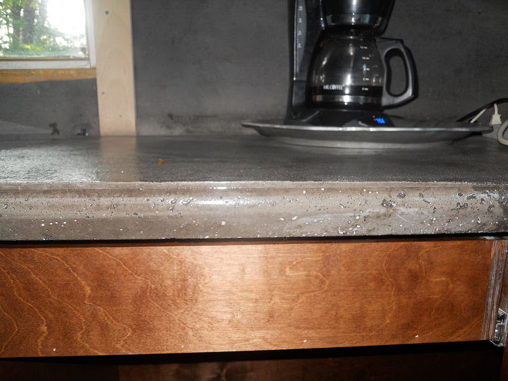 diy cement counter tops don t even think about it here is our, concrete masonry, concrete countertops, countertops, Lovely edge I will never ever do it again I do however like the counters Now I can have the cabinet doors installed drawer fronts attached But that is another post another day