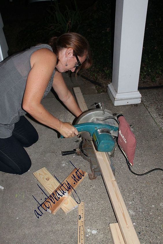 how to build your own farmhouse table for under 100 diy, diy, how to, painted furniture, woodworking projects, here I am cutting the support braces