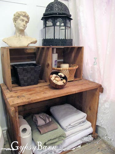 junkin around the house take 1, doors, home decor, repurposing upcycling, Old veggie shipping crate housing the towels in the bathroom now I ll be making a few of these albums Ideas to fab and old junk you likely have laying around your own house Of course this is another example of what you ll see