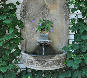 10 great ways to dress up a garden wall or fence, fences, gardening, landscape, outdoor living, 2 Install a wall fountain