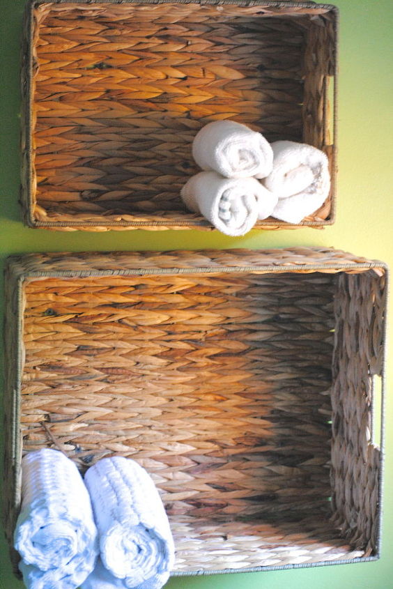 quick bathroom updates on a dime, bathroom ideas, home decor, Here s a quick way to store your towels use baskets as beautiful towel storage 2 years later and my baskets are still holding strong with just two wall screws