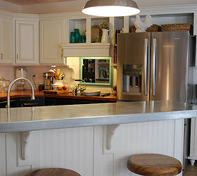 white kitchen, home decor, kitchen design, We had a slipcover made for the bar from galvanized steel by a company that makes commercial range hoods It is just slid in place over the old formica top and can be easily removed if I ever wanted to change it