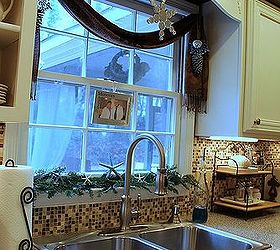 holiday home tour pt 2 how to decorate big on a budget, seasonal holiday d cor, wreaths, Kitchen window decorated for the holidays