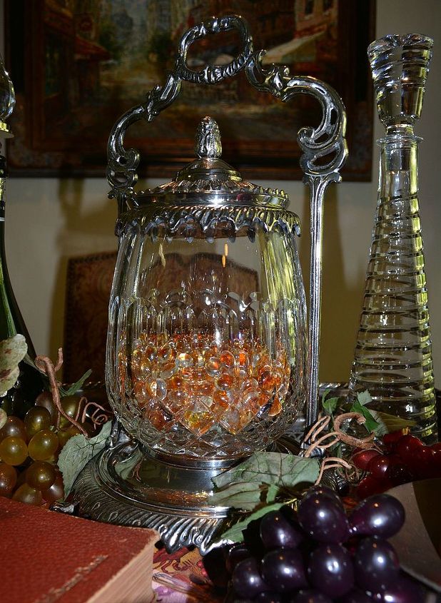 how i decorated my silver tray to bring me joy, home decor, I placed some amber glass beads inside of the cut crystal biscuit jar