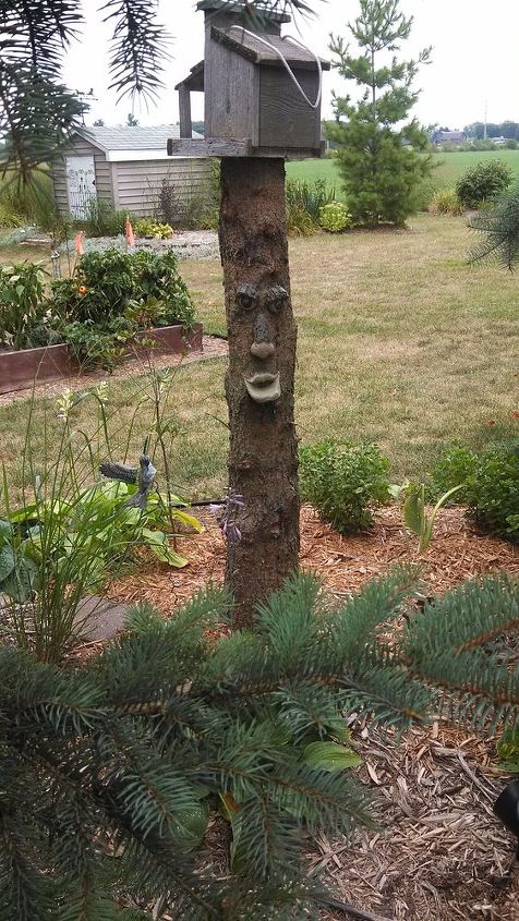 the art of using art in the garden, gardening, repurposing upcycling, Even an old tree stump can be art