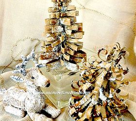 decorating your bathroom for christmas with tp, bathroom ideas, crafts, diy, how to, seasonal holiday decor, Toilet paper Christmas tress made from empty rolls