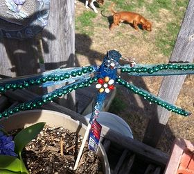 fairy garden art and chicken coop, diy, woodworking projects, Dragonfly made out of sticks and beads that I found I have a lot of great ideas thanks to all of you It is not perfect but neither is nature