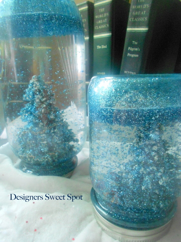 mason jar snow globes, crafts, mason jars, repurposing upcycling, My favorite jars are the ones with the blue glitter They give the illusion of the jar being blue but actually it s a clear jar More tips on the blog