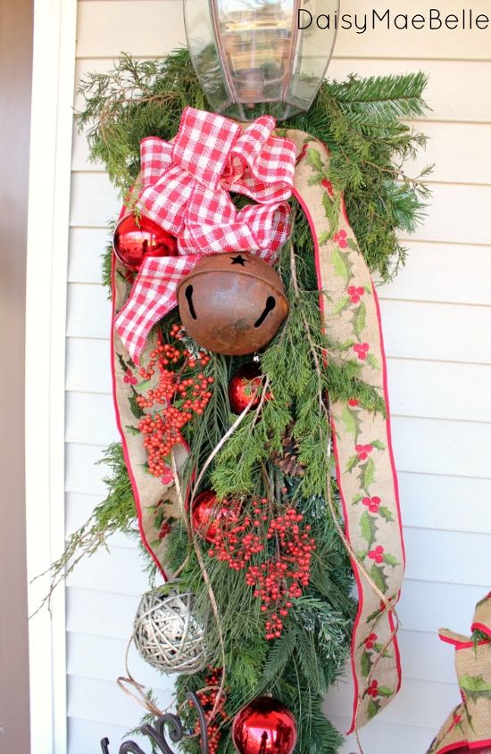 decorating my front porch for christmas, christmas decorations, porches, seasonal holiday decor, I used natural cedar berries grapevine balls giant jingle bells and burlap ribbon for the swags