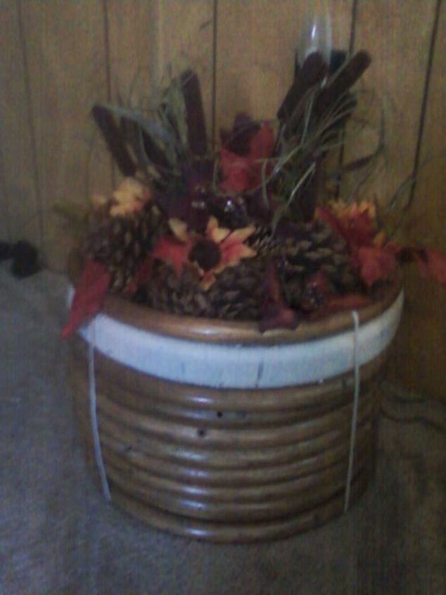 update on things found in my shed, flowers, gardening, repurposing upcycling, after made a planter from the pieces for my artificial flowers and pine cones