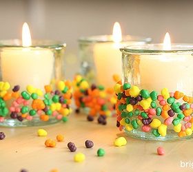 how sweet it is decorating your home with candy, home decor, Candles Give your holders a candy dipped effect this is way sweeter than the paint dipped trend by gluing small candies to the bottom half of the candleholder Spray the candy with sealer to preserve its color