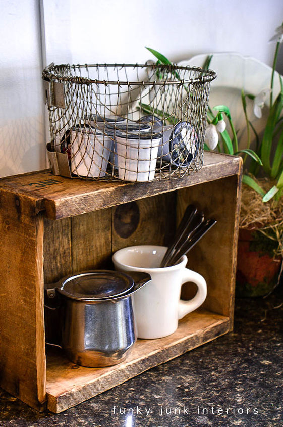 coffee pod storage with a crate and a deep fryer basket, cleaning tips, kitchen design, repurposing upcycling, The create became a rustic shelf of sorts and the basket was the perfect place to grab a new pod at coffee time I love that you can also see the coffee labels as well Simple easy and warm