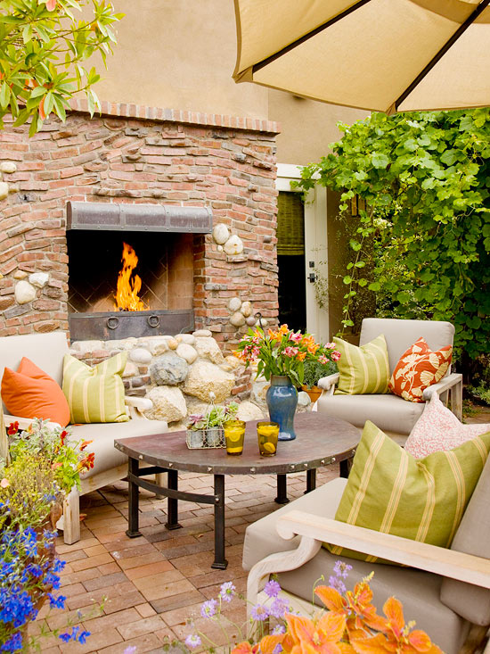 natural elements make perfect outdoor fireplaces tips video, fireplaces mantels, outdoor living, patio, porches, Do you love this outdoor fireplace raised for better heating and out of harm s way