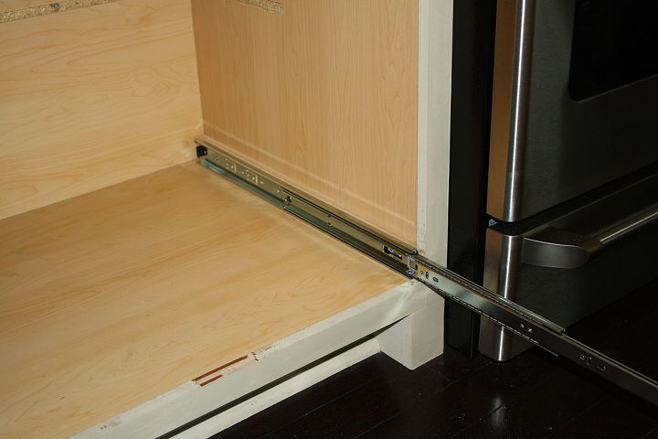 making a kitchen cabinet more functional, kitchen cabinets, shelving ideas, Added rails