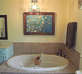 master bathroom makeover, bathroom ideas, home decor, Added a new chandelier over the tub we know it s not to code but it looks so pretty