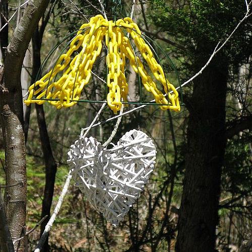 garden art and features, flowers, gardening, outdoor living, succulents, Inverted wire hanging basket with yellow plastic chain and a white woven heart