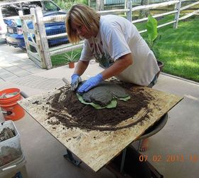 making garden art birdbaths, applying the cement to the leaf I started in the middle worked my way out to the edge of the leaf about an inch thick