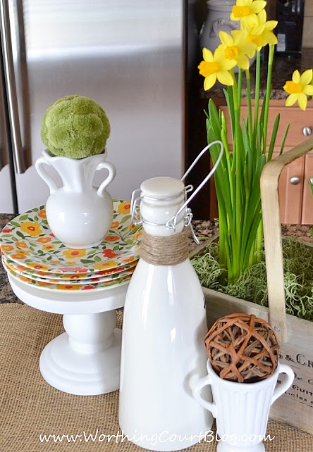 using grocery store flowers to add a breath of spring, home decor, kitchen design, seasonal holiday decor, Gather dishes and accessories from around the house to create a vignette in no time at all